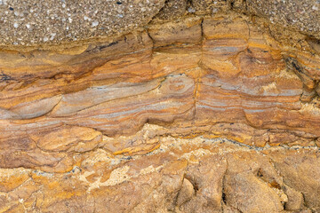 Beautiful sandstone at Salt Point State Park, California, USA, displaying different layers of rock - 610838786