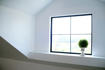 White room with window .