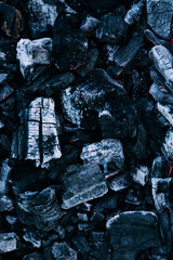 Background of burning hot coals. Burning coals in the brazier, barbecue grill