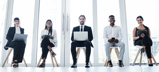 Line, group portrait and people in waiting room with technology and diversity at interview in office. Happy faces, hiring of men and women with business team online for recruitment or human resources