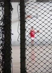 basketball court fence to limit and for the safety of spectators and players
