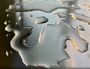 Fototapeta premium water drops on metalic surface