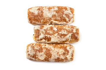 Rectangular gingerbread on a white background. A bunch of gingerbread close-ups. Three gingerbread.