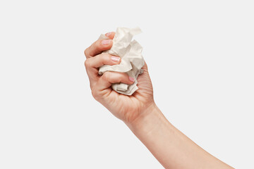 Hand catch white crumpled paper isolated on white background