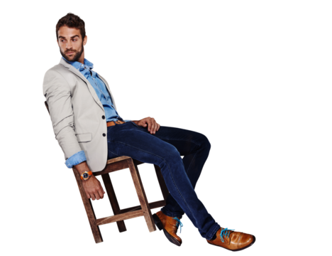 Man, fashion and relax on wooden chair for stylish casual clothing isolated on a transparent PNG background. Confident male person or young model with style relaxing, leaning or sitting on furniture