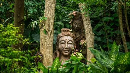 Sculpture hidden in the vegetation truth sanctuary in Pattaya, Thailand.