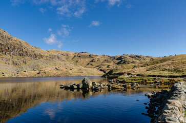 Beautiful high altitude lake Stickle Tarn in Lake District, England, UK