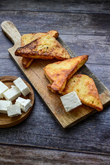 French toast  and white cheese. Rustic breakfast  made from deep fried   bread   with organic free range   eggs