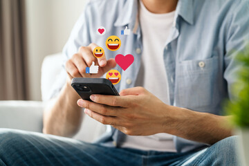 Man using smartphone typing, chatting conversation, watching video live streaming. Social network, technology concept