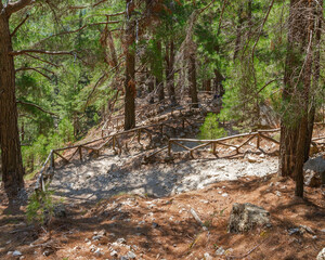 Trail for hikers in the Samaria gorge in Crete, Greece. Samaria national Park. The tourist route.