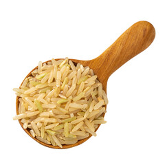 Brown rice in a wooden spoon isolated on a transparent background.