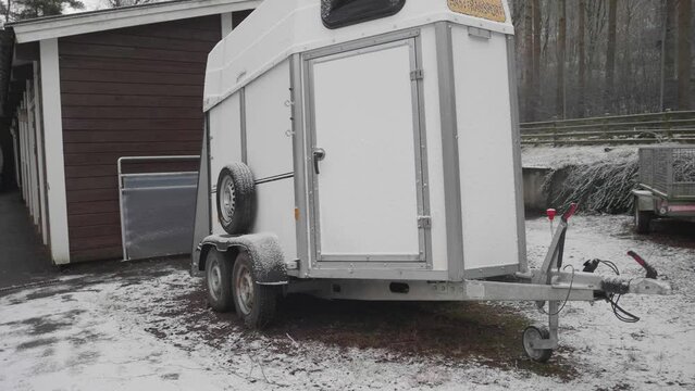 Horse trailer parked at winter, Dolly shot