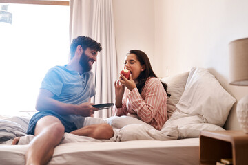 Naklejka na ściany i meble Couple, bedroom and eating birthday cupcake, surprise candy dessert or celebration sweets on Italy holiday. Breakfast muffin, morning food or woman hungry, relax and celebrate special day on home bed