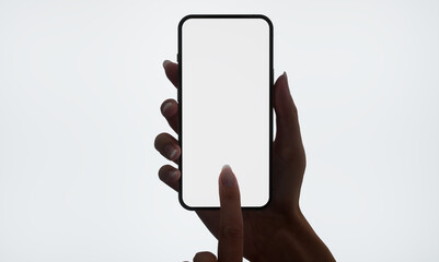 CU 20s Caucasian female holding a phone in a right hand. White background