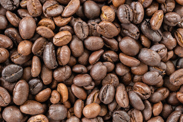 Fresh roasted brown coffee beans background