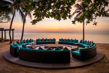 Naklejka na ściany i meble Beachfront sunrise with pool and palm trees in Hua Hin, Prachuap Khiri Khan, Thailand