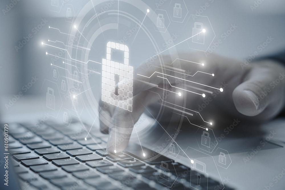 Poster Close up of man hands using laptop keyboard on desktop with glowing circuit padlock hologram on blurry background. Secure and safety concept. Double exposure.