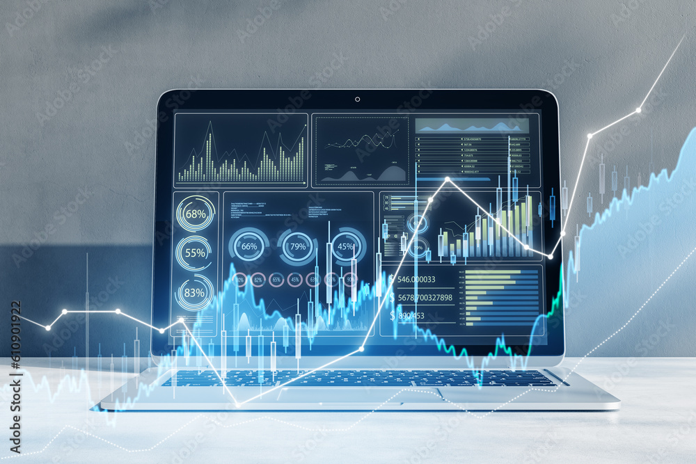 Poster close up of laptop computer at workplace with glowing candlestick forex chart on blurry background. 