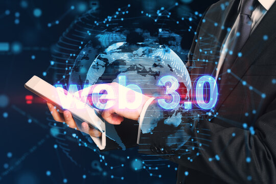 Blockchain, modern internet technologies and new internet generation concept with blue web 3.0 sign and planet globe hologram on businessman using digital tablet background, double exposure