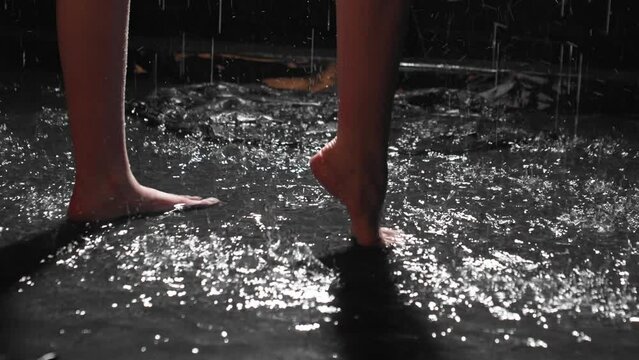 Women's feet in the water. photo studio with aqua zone 