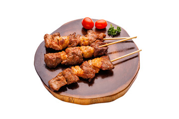 Delicious grilled meat and other ingredients falling on white background