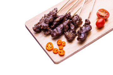 Grilled beef steak with spices on cutting board  on white background