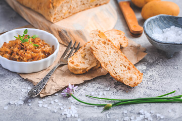 Homemade oven baked bread with carrots and onions