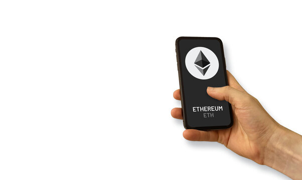Hand holding a phone with an ethereum screen on a white background. Cryptocurrency logo eth for marketing.