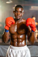 Inspirational exercise and fitness portrait of African American male athlete, intense and powerful...