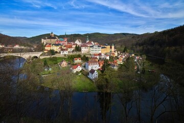 Fototapeta na wymiar Aerial view of medieval town Loket nad Ohri near Karlovy Vary spa in Czech Republic. Historical city with castle from 12th century. Stunning scenic view of beautiful cityscape with nature.