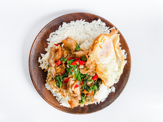 Rice topped with crispy pork belly with Thai basil and fried egg