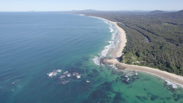 Aerial View Over Wenonah Head With Turquoise Seascape In Urunga, NSW, Australia - drone shot