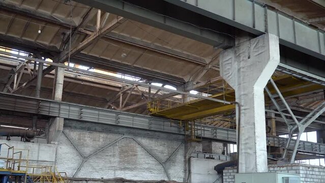 Pipe manufacturing plant. Pipe plant. Iron pipe welding. Pipe expansion. Sparks of welding. Tap. Factory. Machine tools. Production. Heavy industry.