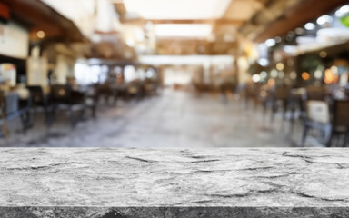 stone board empty table in abstract blurred cafe background