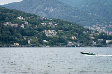Obraz premium Como lake in Italy with clouded sky. Tourist place