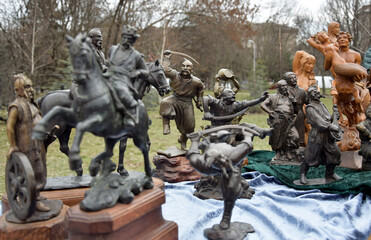 Fototapeta na wymiar Figurines of Ukrainian Cossacks and fairy-tale characters