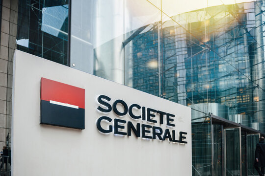 Paris, France - Dec 3, 2014: This photo shows the impressive exterior of a state-of-the-art office building in Paris La Défense business district, featuring glass and Societe Generale bank signage.