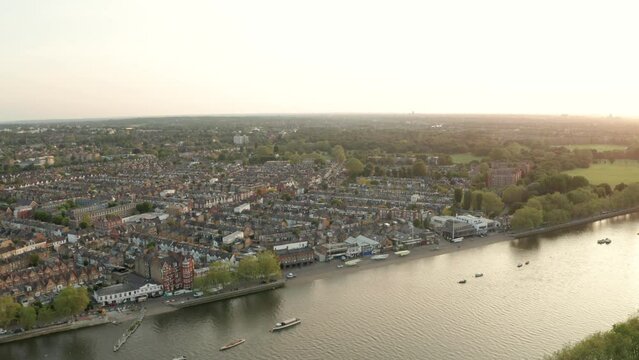 Rising aerial shot of Putney riverside west London