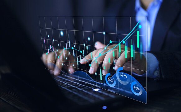 Stock exchange market investment concept. Business person following business trend candle chart finacial data on laptop interface vertual screen. Business strategy.