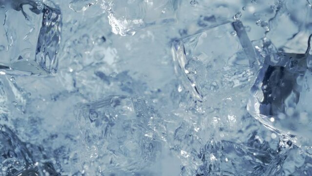 Super Slow Motion Shot of Falling and Splashing Perfect Ice Cubes into Water at 1000fps.