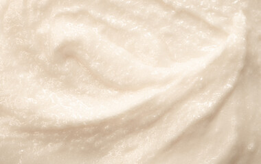 Baby food close-up. Porridge for newborns. Background food texture for kids. Milk mixture.