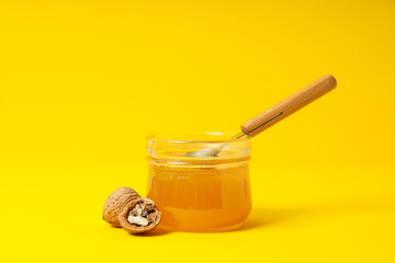 Concept of tasty and sweet food - honey with nuts