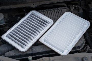 Used and new car engine air filters. Car maintenance. 