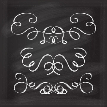 Inc pen calligraphy flourishes set on a chalkboard background. Vector swirl dividers collection.