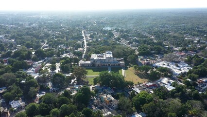 Aerial view with camera down on the Convent de San Bernardino in Valladolid, Yucatan, Mexico in early morning.