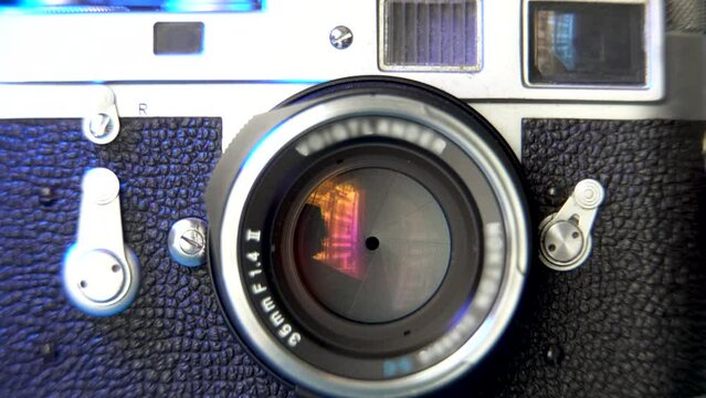 Film Photography Background Footage, Blue tint Light on Leica M2 Vintage Camera