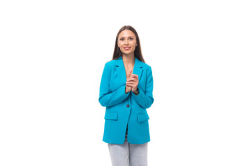 stylish young brunette businesswoman in blue jacket isolated on white background with copy space