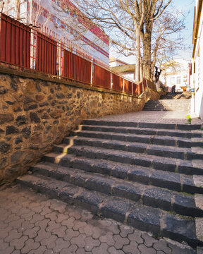 european downtown street with steps. travel and sightseeing concept