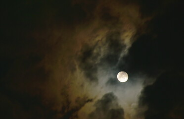 Naklejka na ściany i meble bright moon floating on sky in cloud background 