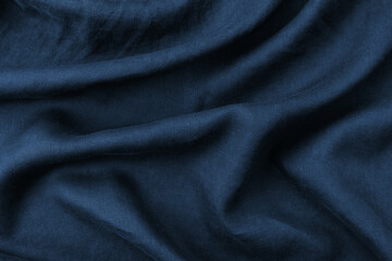 Fototapeta na wymiar Draped navy linen fabric background.